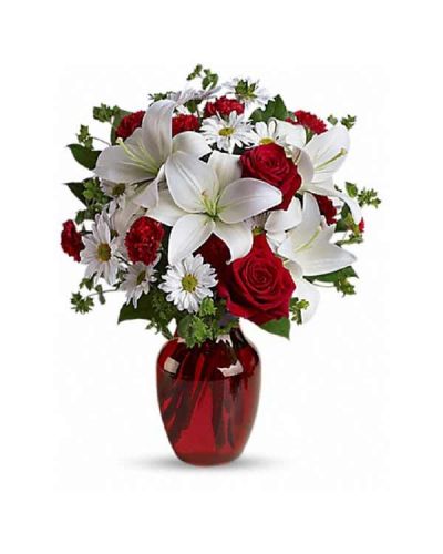 <div class="m-pdp-tabs-description">
<div id="mark-1" class="m-pdp-tabs-marketing-description">
<hr />
The spirit of love and romance is beautifully captured in this enchanting bouquet. It's the perfect gift for anyone you love.
</div>
</div>
Red roses and carnations are exquisitely arranged with white asiatic lilies and chrysanthemums in a ruby red glass vase. It's lovely.
