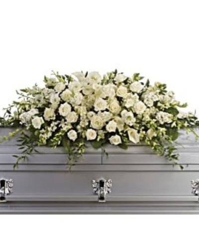<div id="mark-1" class="m-pdp-tabs-marketing-description">The peaceful purity of this all white casket spray is a touching, inspiring way to honor the departed. Large in scale, the lush arrangement is ideal for a full couch or closed casket service, featuring elegant white blooms such as calla lilies, dendrobium orchids and hydrangea.</div>
<div id="desc-1">
<ul>
<li>White roses, orchids, large calla lilies and perfect stems of hydrangea.</li>
</ul>
</div>