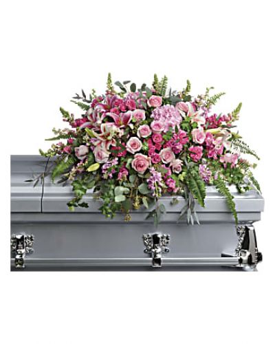 <div class="m-pdp-tabs-description">
<div id="mark-1" class="m-pdp-tabs-marketing-description">Like your beautiful memories, this dramatic spray of pink hydrangea, roses and lilies will take your breath away. A fresh, feminine symbol of hope for the service.</div>
</div>
<p id="arrngDescp">This dramatic spray features pink hydrangea, pink roses, pink spray roses, pink stargazer lilies, pink carnations, pink larkspur, pink snapdragons, pink stock, green ivy, sword fern, silver dollar eucalyptus, seeded eucalyptus, and lemon leaf.</p>