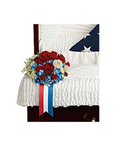 <div id="mark-1" class="m-pdp-tabs-marketing-description">Adorn the casket with a proud display of patriotism. This breathtaking arrangement of blue hydrangea and rich red and white roses is a touching tribute to an honorable legacy.</div>
<div id="desc-1">
<ul>
<li>Blue hydrangea, red roses, red spray roses, white spray roses, white button spray chrysanthemums, and white waxflower are accented with galax leaf.</li>
</ul>
</div>