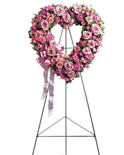 <div id="mark-1" class="m-pdp-tabs-marketing-description">In the shape of a heart, and accented with a pink satin ribbon, this garden of delicate blooms is a tender and classic tribute to a precious life, and a cherished expression of love and sympathy.</div>
<div id="desc-1">
<ul>
<li>Beautiful flowers such as light pink roses, hydrangea and miniature carnations mix with lavender chrysanthemums on an open heart-shaped wreath.</li>
</ul>
</div>