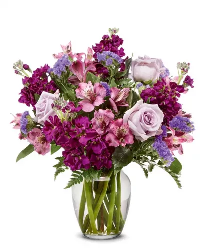 <p>The stunning Purple Paradise Bouquet creates a bold splash of color upon arrival, creating a gift of floral style and design your special recipient will always remember. Weaving together lavender roses, purple stock, lavender Peruvian Lilies, purple statice, and lush greens, this flower bouquet exhibits levels of texture and color that will make them take notice. This beautiful perfect present of flowers is ready to express your warmest wishes for a birthday, as a thank you, or as a way to let them know how much you care.</p>
<p><b>Includes:</b><br />
• Lavender Roses<br />
• Purple Stock<br />
• Lavender Alstroemeria<br />
• Purple Statice<br />
• Floral Greens<br />
• Complimentary Card Message<br />
• Clear Vase</p>