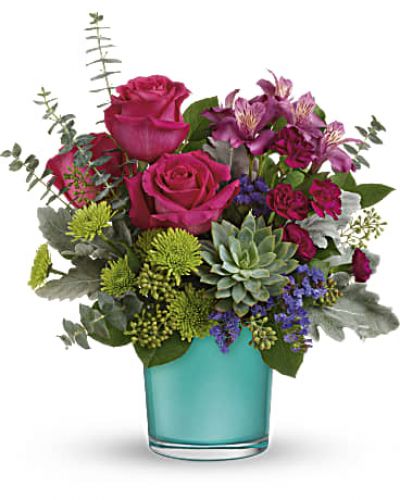 <div id="mark-3" class="m-pdp-tabs-marketing-description">
<div id="mark-3" class="m-pdp-tabs-marketing-description">
<div id="mark-3" class="m-pdp-tabs-marketing-description">
<div id="mark-3" class="m-pdp-tabs-marketing-description">A wonderland of color! This vibrant mix of dark pink roses with pops of green and purple looks especially wondrous in this shimmering blue topaz-colored vase! A glorious gift for any occasion.</div>
<p>&nbsp;</p>
<div id="desc-3">
<p>This wondrous arrangement features dark pink roses, dark pink alstroemeria, miniature purple carnations, green button spray chrysanthemums, blue sinuata statice, dusty miller, spiral eucalyptus, seeded eucalyptus, lemon leaf, and a large green echeveria succulent plant.
</p></div>
</div>
</div>
</div>