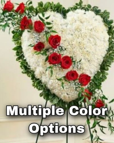 <p>This beautiful floral tribute shows your undying love during this difficult time. This standing spray arrangement in the shape of a heart is created from fresh white carnations, red roses, baby's breath and more. Traditionally sent directly to the funeral home by family members or friends and displayed on a stand.</p>