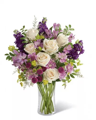 <p>This lushful bouquet full of purple florals will delight your loved one for days. Perfect gift to celebrate Mother's Day, a birthday or just because. Hand-delivered by a local florist in a cylinder vase.</p>
<p><b>Includes:</b><br />
• Crème Roses<br />
• Lavender Alstroemeria<br />
• Purple Stock<br />
• Purple Button Chrysanthemums<br />
• Lavender Cushion Spray Chrysanthemums<br />
• White Limonium<br />
• Cylinder Vase</p>