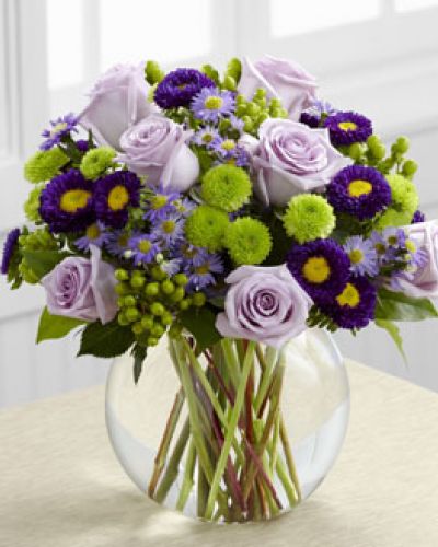 <p>The Splendid Day Bouquet, set with roses and asters, creates the perfect bouquet for any of life's special moments.</p>
<p>Lavender roses, lavender monte casino asters, purple matsumoto asters, green hypericum berries, green button poms and lush greens create a stunning flower bouquet perfectly arranged in a clear glass bubble bowl vase to create a wonderful thank you, happy birthday or congratulations gift.</p>